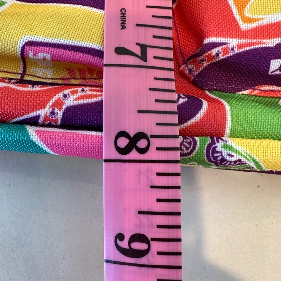 Lily Bloom cross-body purse with flip-flops and sun hats.Size 10 by 8 inches - Picture 5 of 8